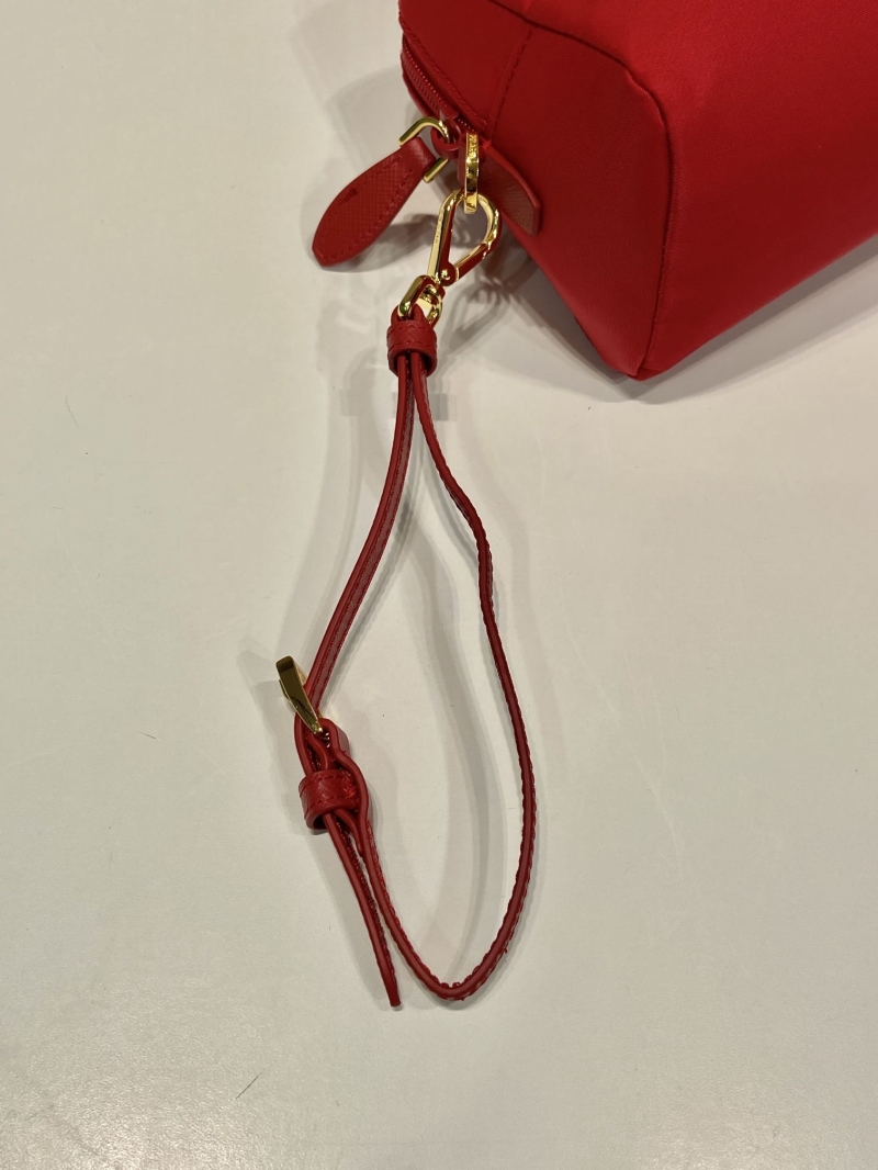 Pra*a clutch bags